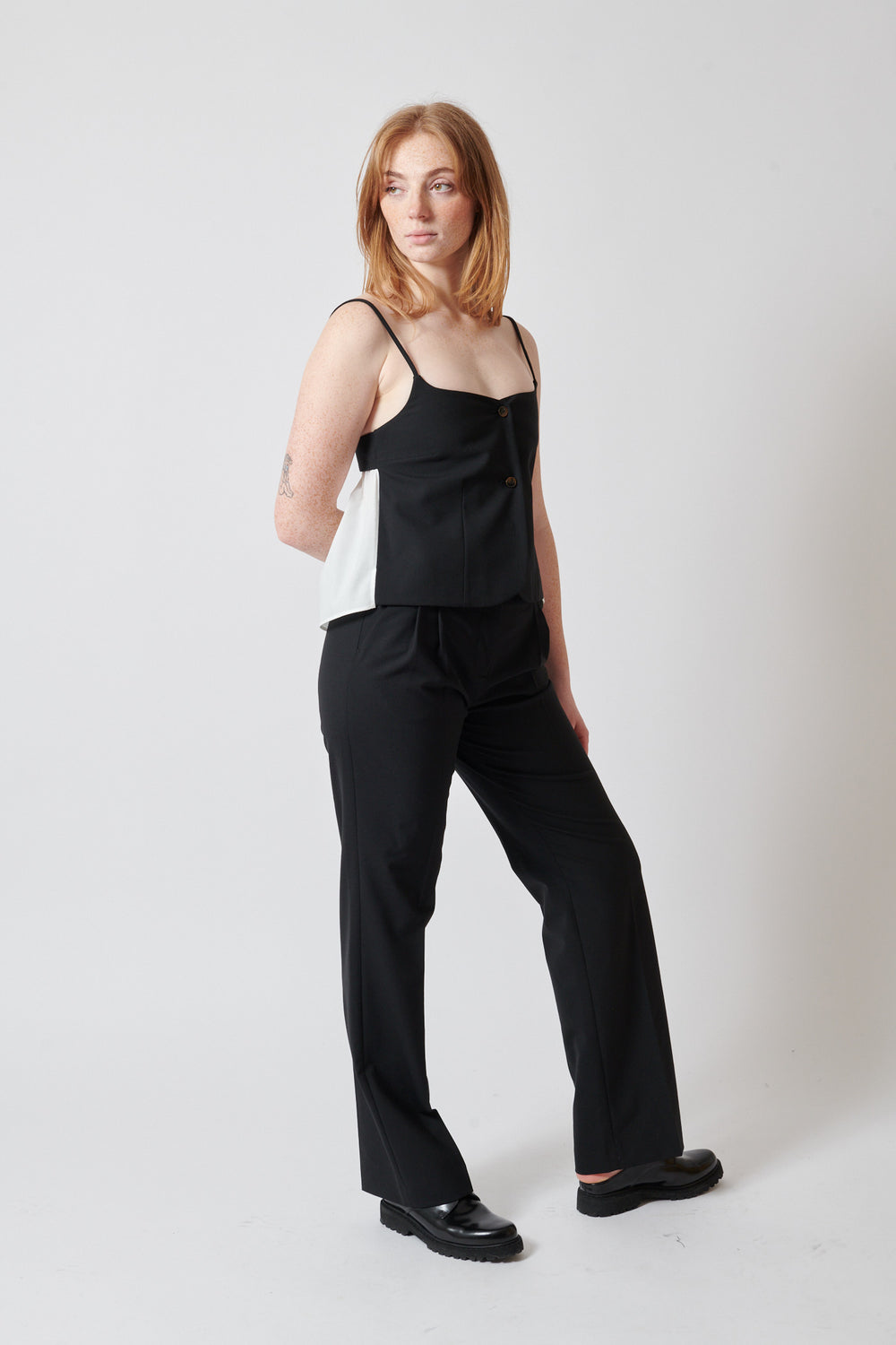 Waverly wearing The Garment Noah Pants front view