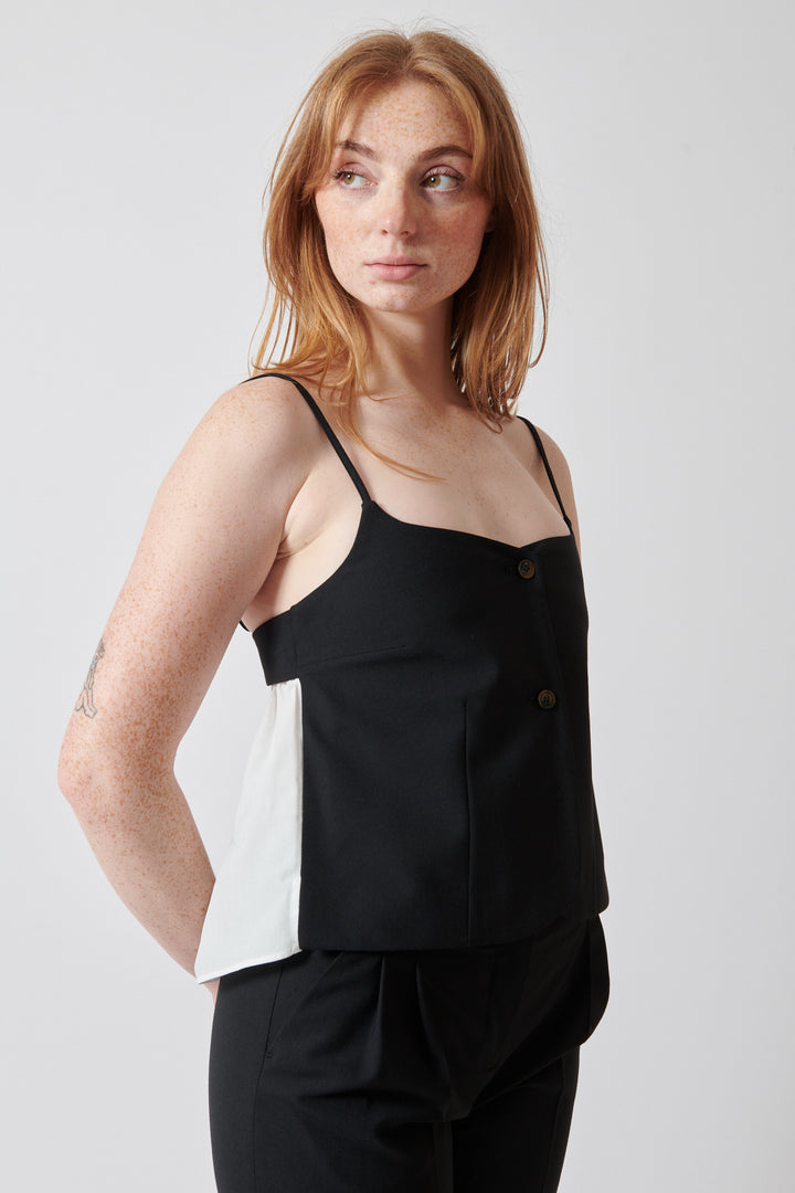 Waverly wearing The Garment Noah Tank Top front view