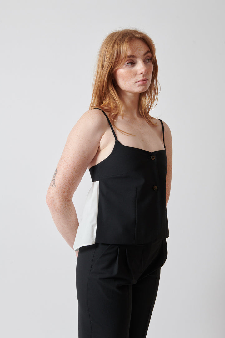 Waverly wearing The Garment Noah Tank Top front view