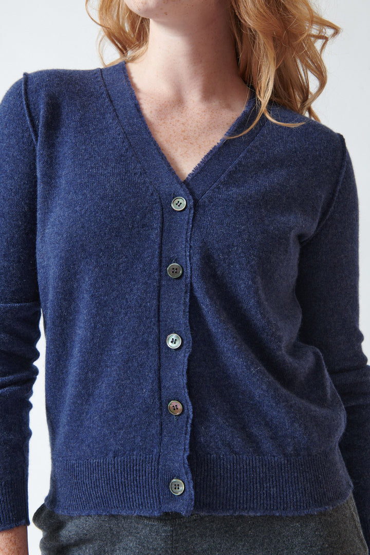 Model wearing Jumper 1234 Cashmere Distressed Vee Cardigan front detail view