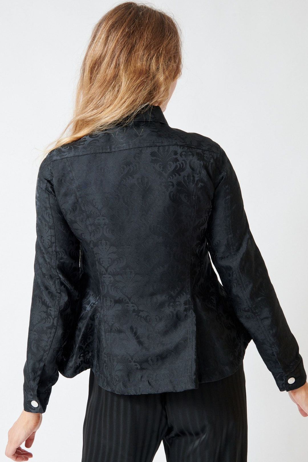 Mari wearing Comme des Garçons Poly Anna Jacket Black rear view