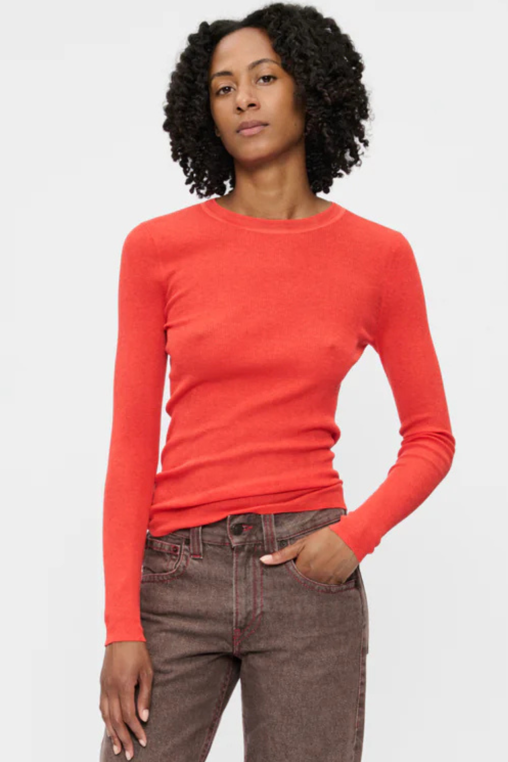 Model wearing 6397 Long Sleeve Heirloom T Orange Red front view