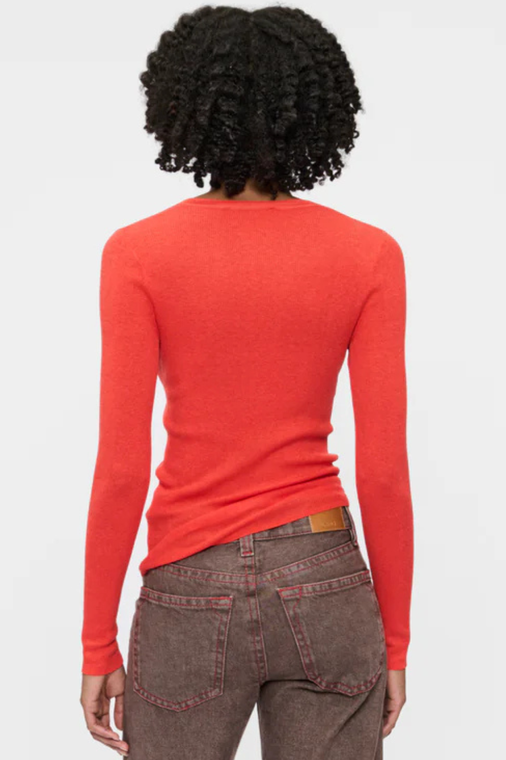Model wearing 6397 Long Sleeve Heirloom T Orange Red rear view