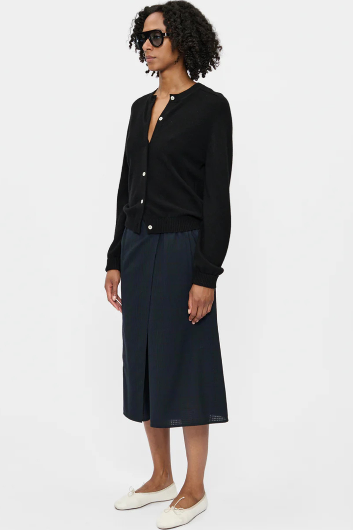 Model wearing 6397 Wrap Short Navy Tartan front/side view 