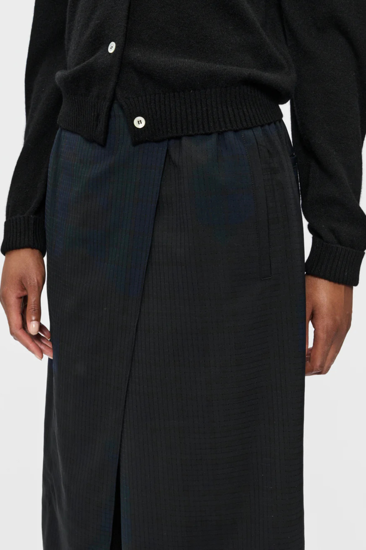 Model wearing 6397 Wrap Short Navy Tartan front/detail view 