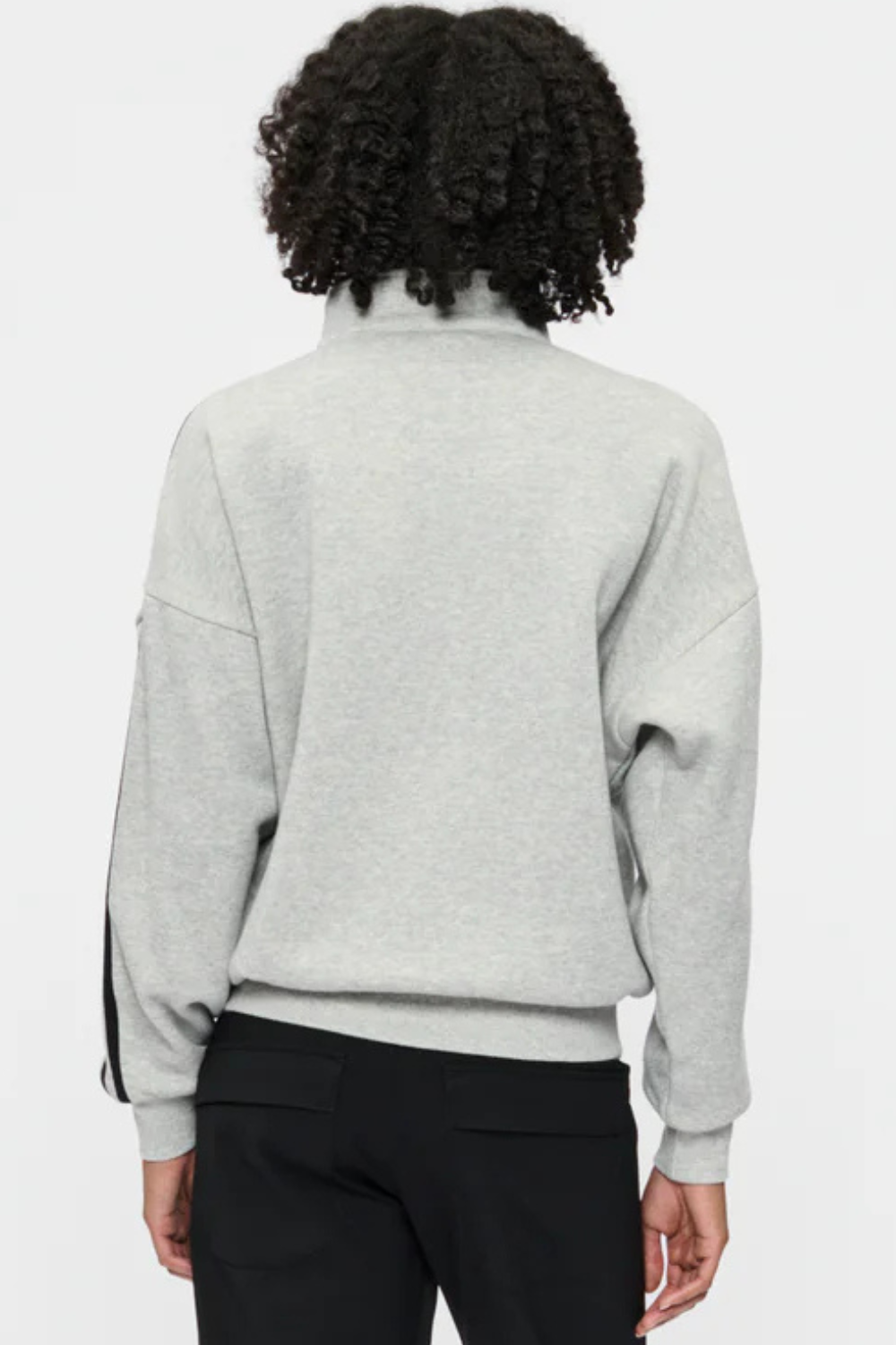 Model wearing 6397 Fleecy Track Zip Up rear view