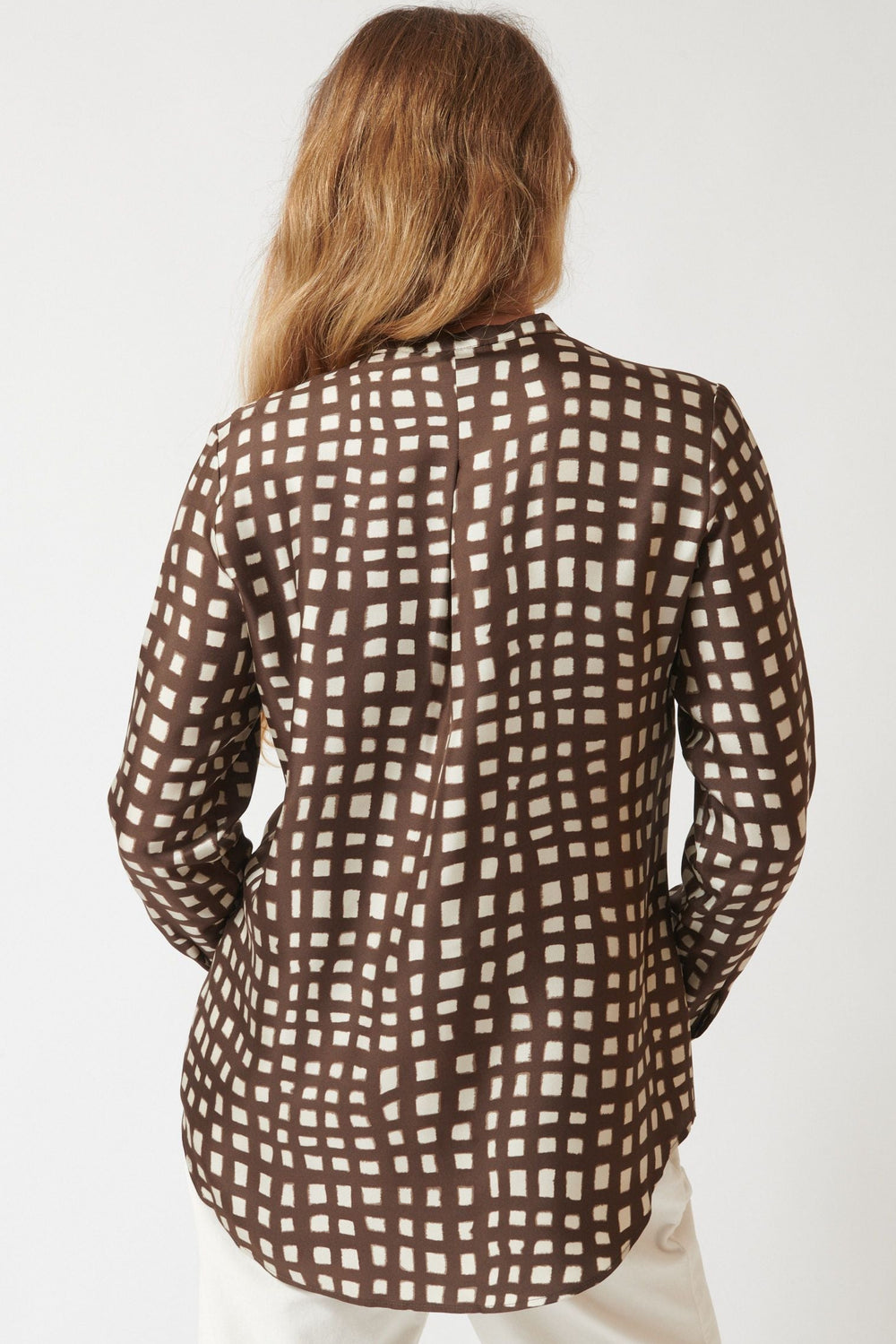 Mari wearing Rosso 35 SueEllen Blouse rear view