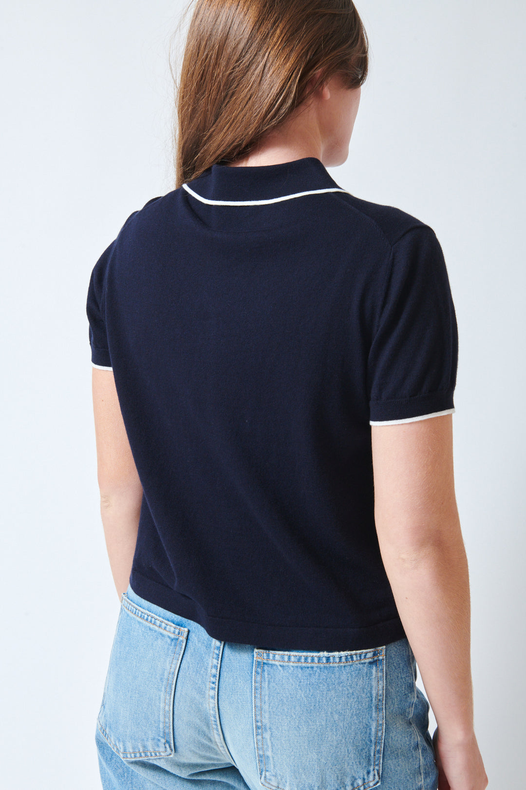 Julia wearing Allude Touch On Cotton Silk Cashmere Poloneck Sweater Deep Night Fleur de Sel rear view