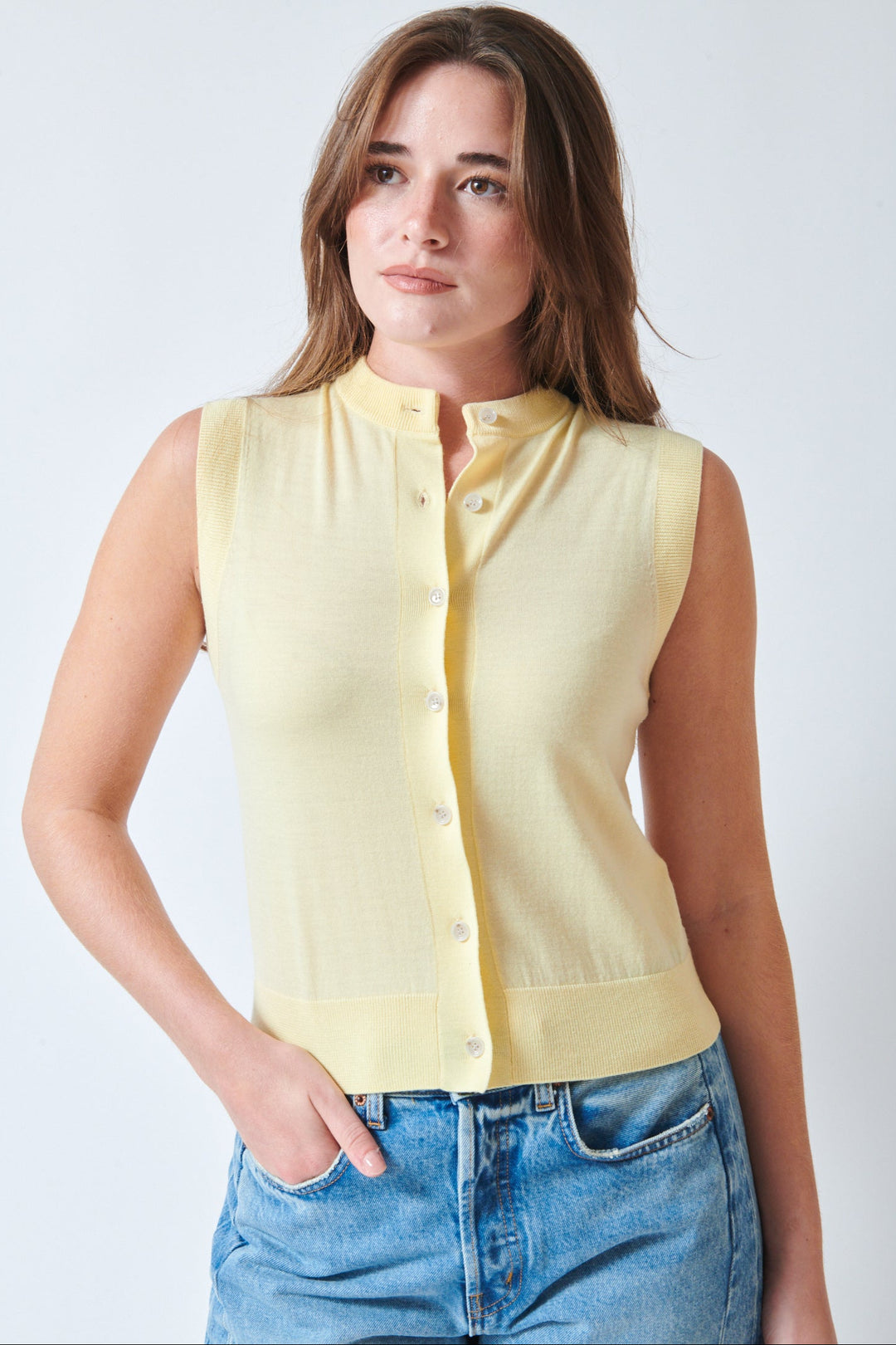 Julia wearing Allude Touch On Wool Button Down Knit Vest Pale Lemon front view