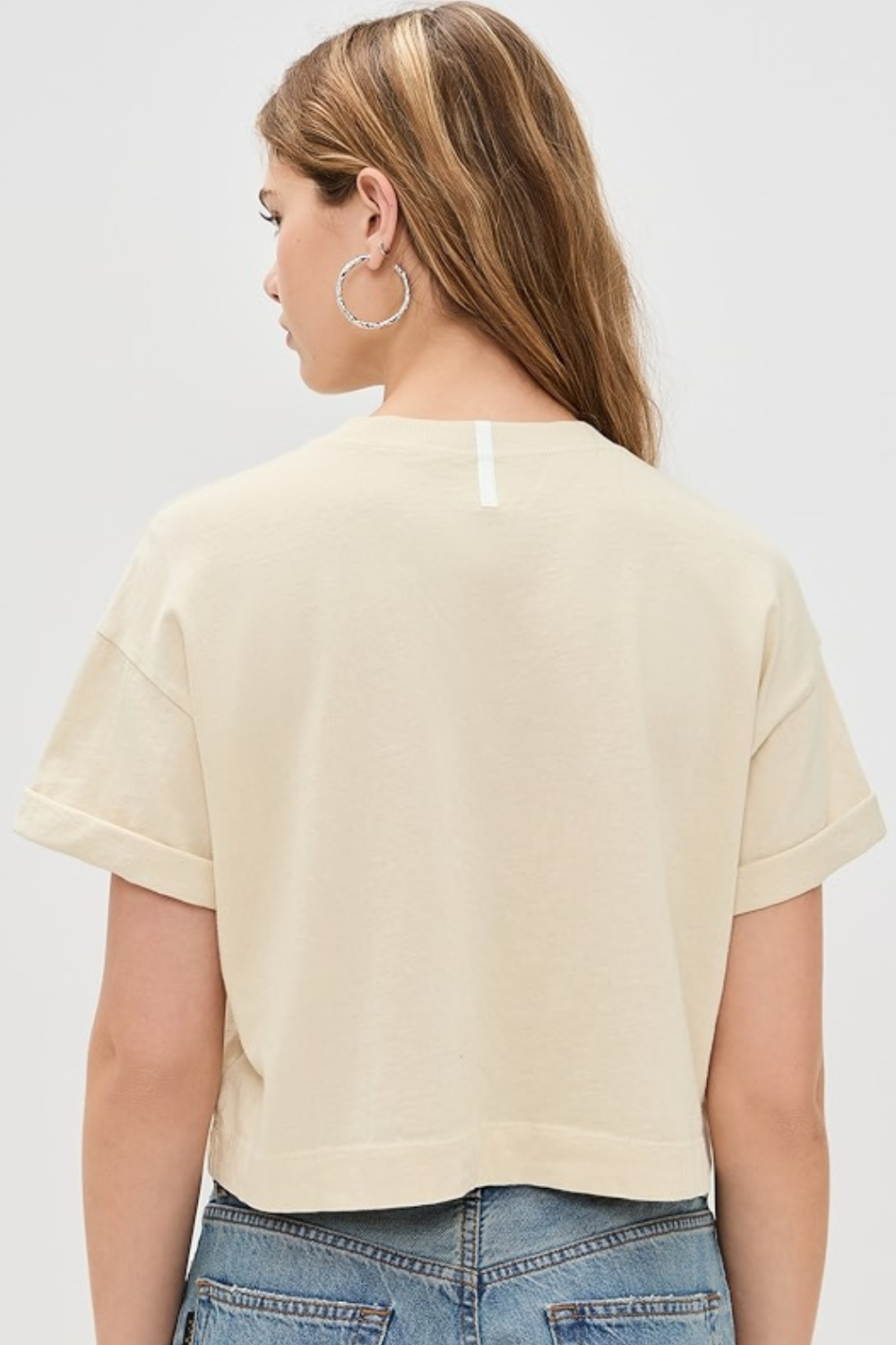 Model wearing ASKK NY Cuff Tee rear view