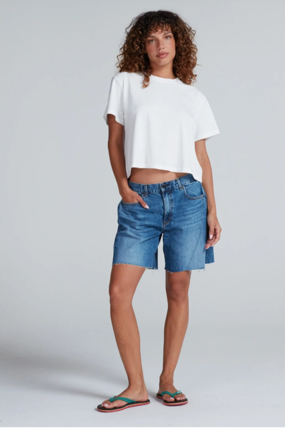 Model wearing ASKK NYC Sloop jean short for Grethenn House