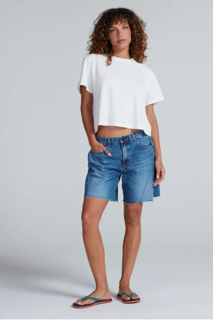 Model wearing ASKK NYC Sloop jean short for Grethenn House