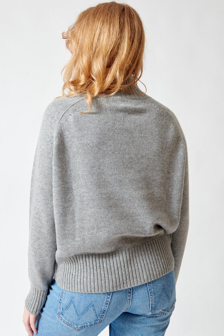 Waverly wearing Allude Full Sleeve Patty Sweater rear view