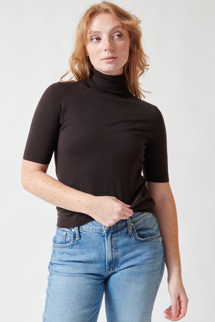 Model wearing Allude Half Sleeve Beth Turtleneck Sweater Molasses front view