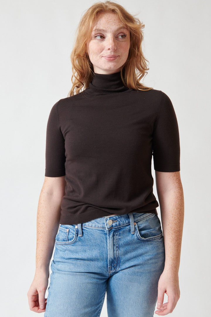 Model wearing Allude Half Sleeve Beth Turtleneck Sweater Molasses front view