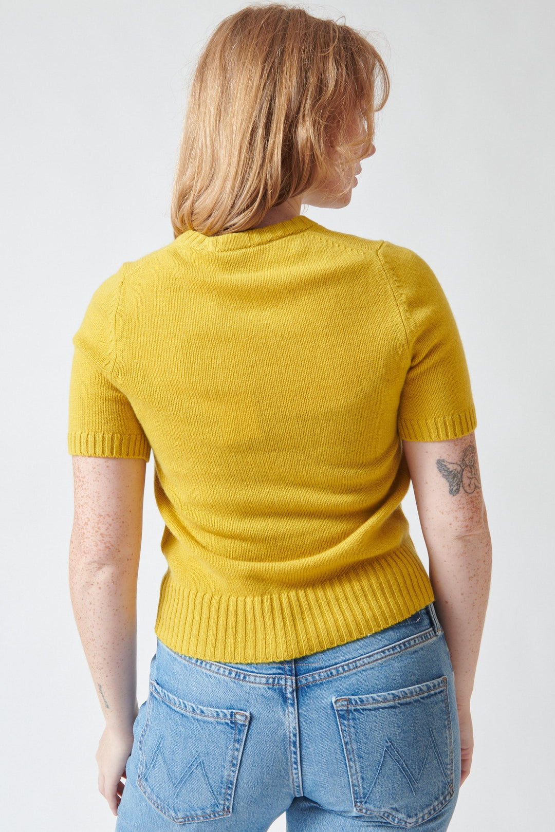 Waverly wearing Allude Quarter Sleeve Frankie Sweater Golden Quince rear view