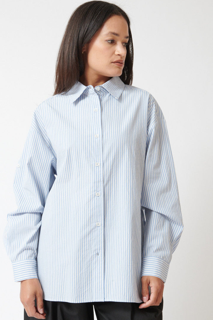 Amanda wearing Apiece Apart Isolde Button Down front view