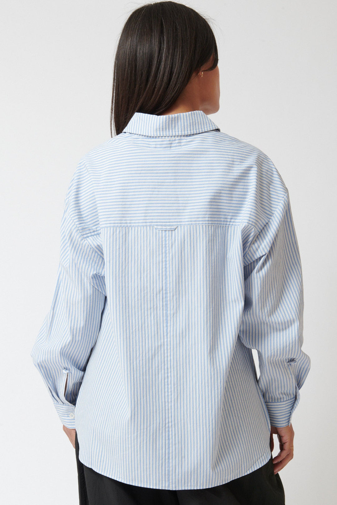 Amanda wearing Apiece Apart Isolde Button Down rear view