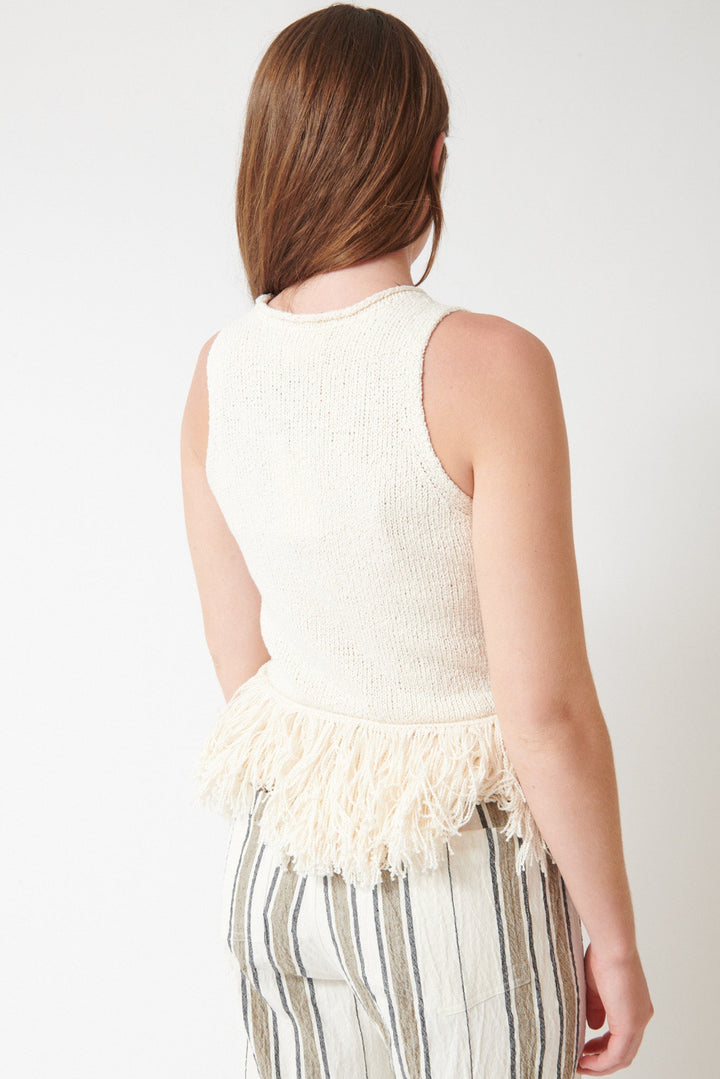 Julia wearing Apiece Apart Maeve Knit Fringe Tank rear view