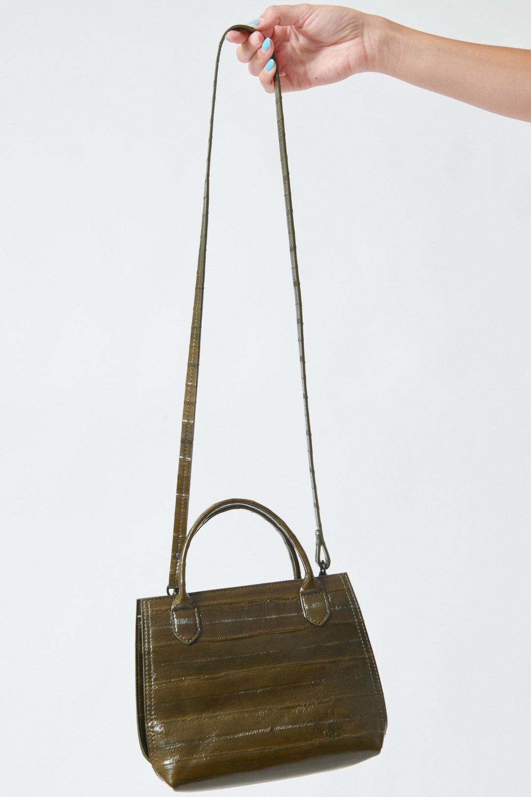 Model holding B.May Mini Day Bag front view