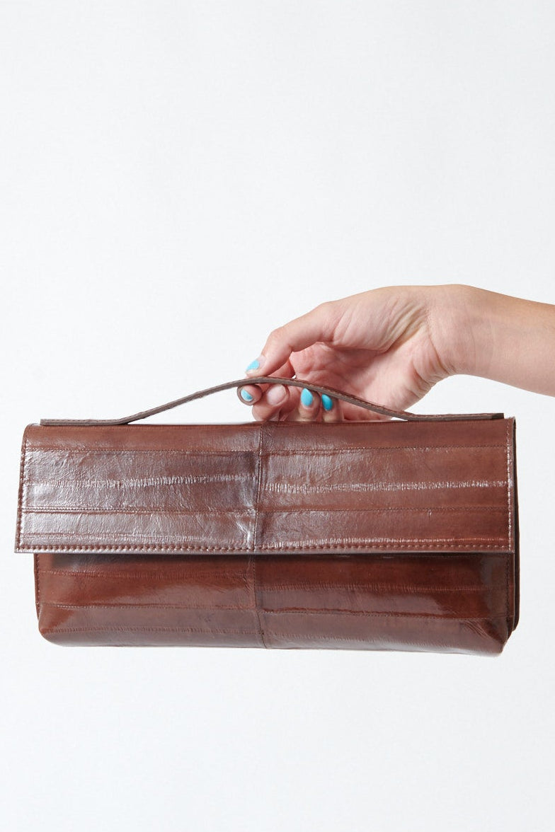 Model holding B.May Top Handle Clutch front view