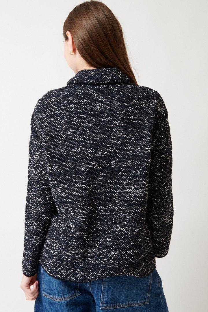 Angela wearing Base Cotton Nylon Knit Stitch Shirt Black White Slate Melange rear view