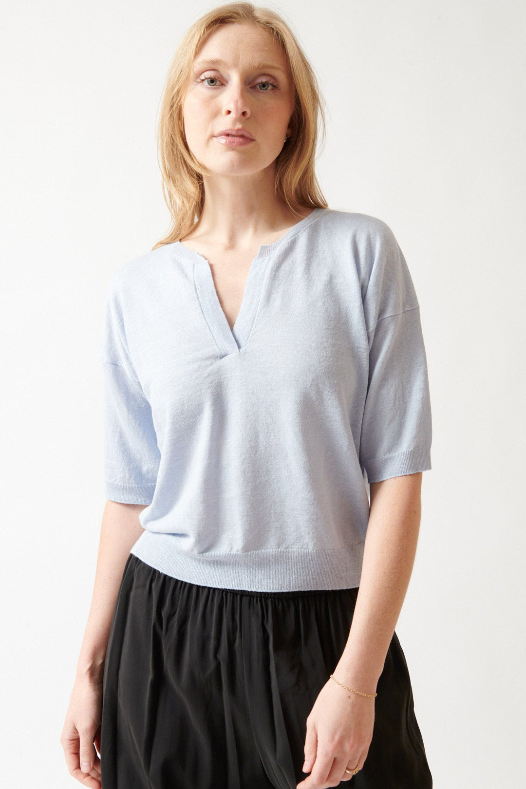 Madi wearing Base Linen Cotton Knit Split Neck Top front view