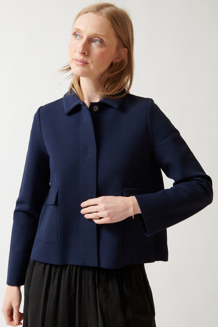 Madi wearing Base Snap Closure Knit Jacket Navy front view