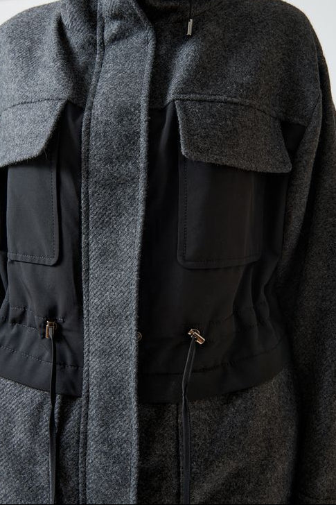 Model wearing Mantu Soft Wool Coat front/detail view