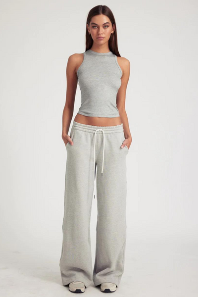 Model wearing SPRWMN Baggy Athletic Sweatpants front view