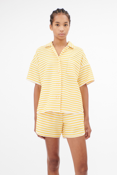 Model wearing Odeeh Glass Button Striped Knit Cabana Shirt front view