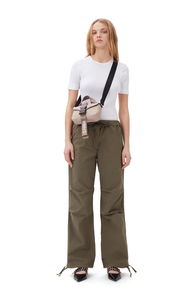Model wearing Ganni Washed Cotton Canvas Draw String Pants front view