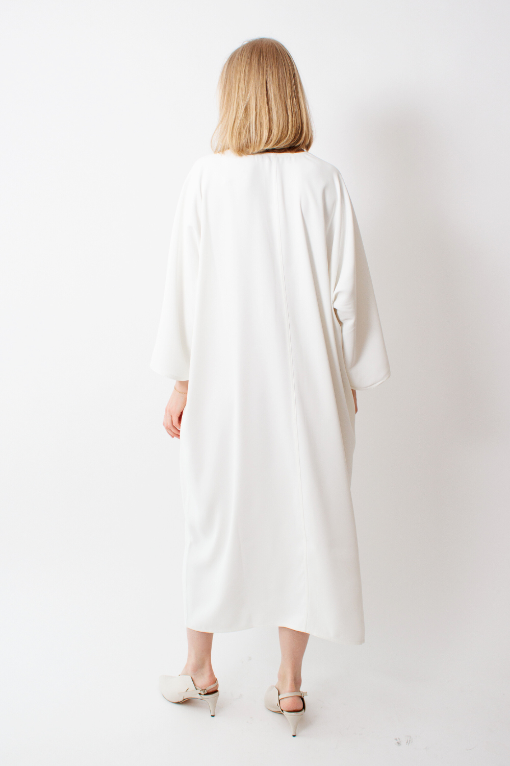 Madi wearing Sofie D'Hoore Dakar Kimono Dress rear view