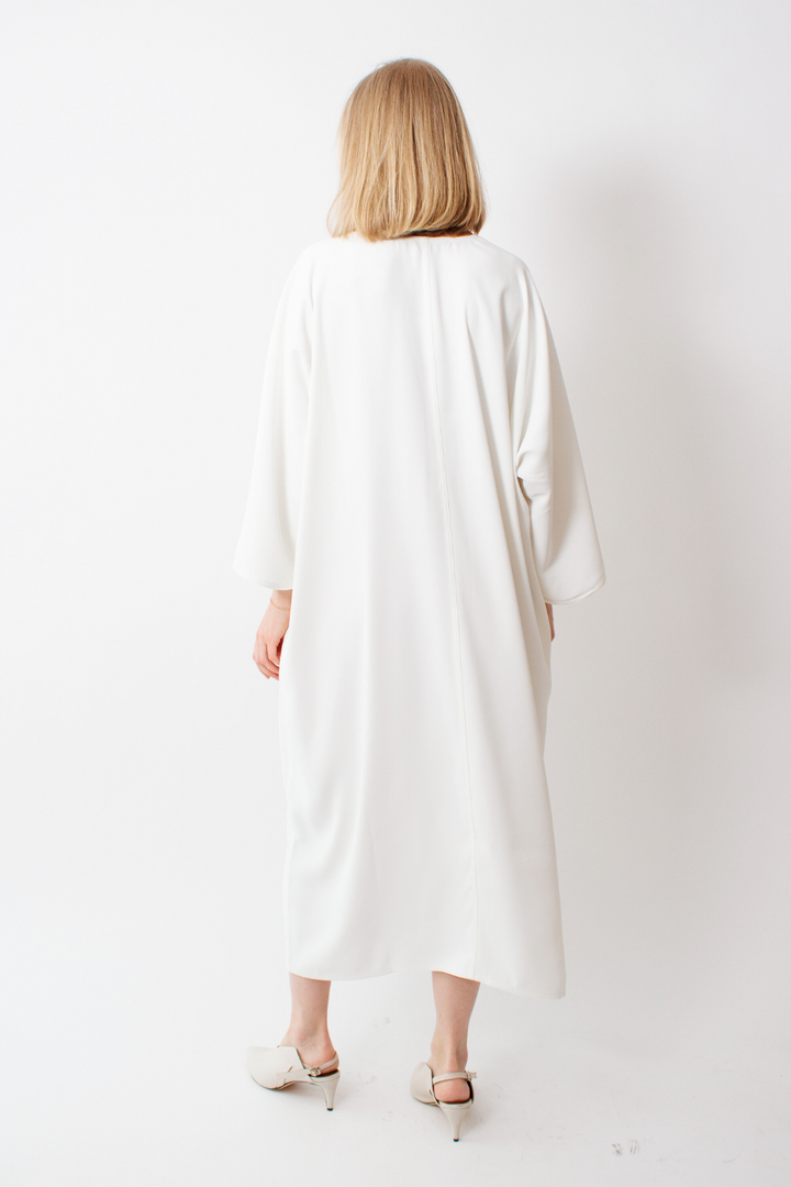 Madi wearing Sofie D'Hoore Dakar Kimono Dress rear view