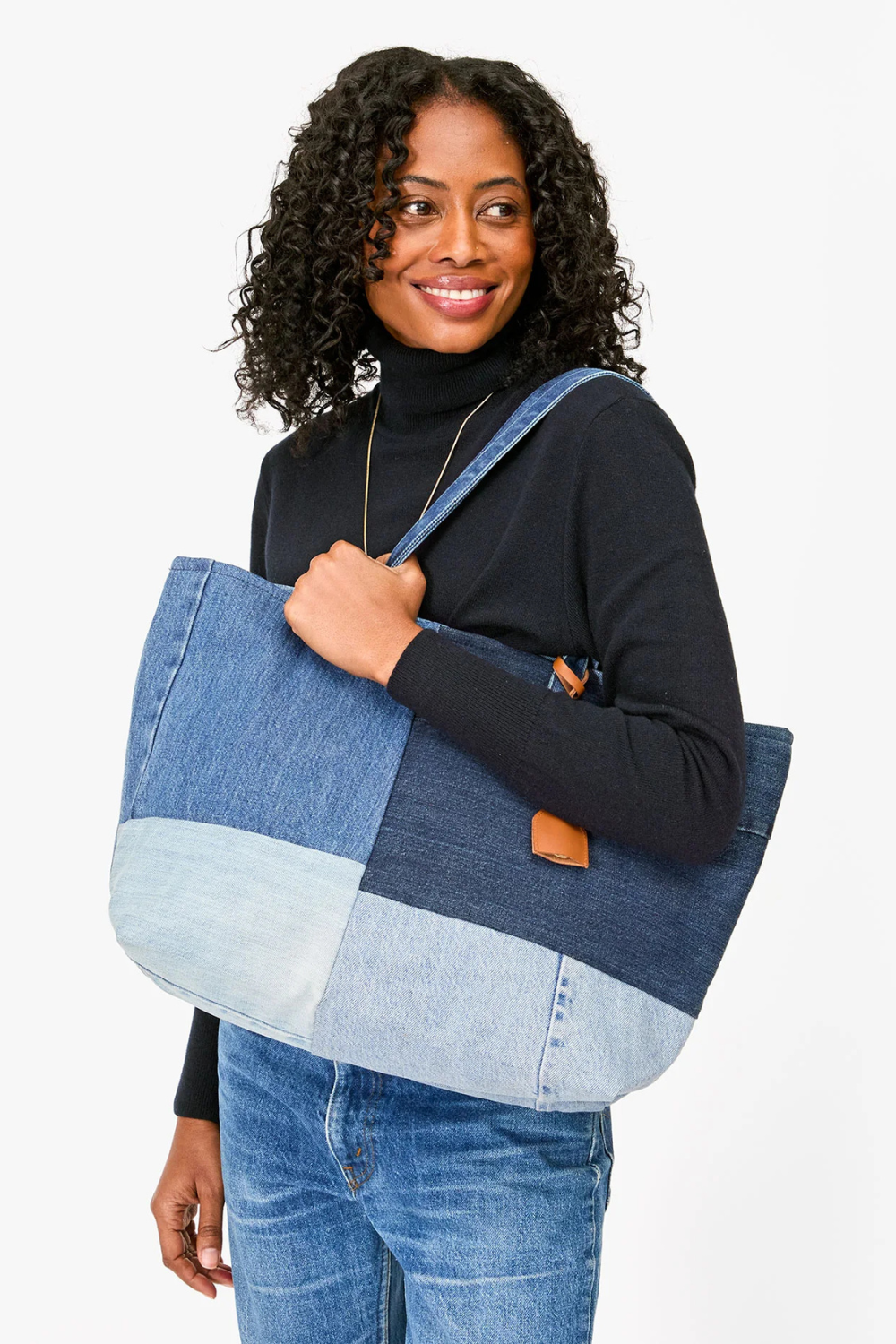Model wearing Volie Tote Washed Denim Patchwork 