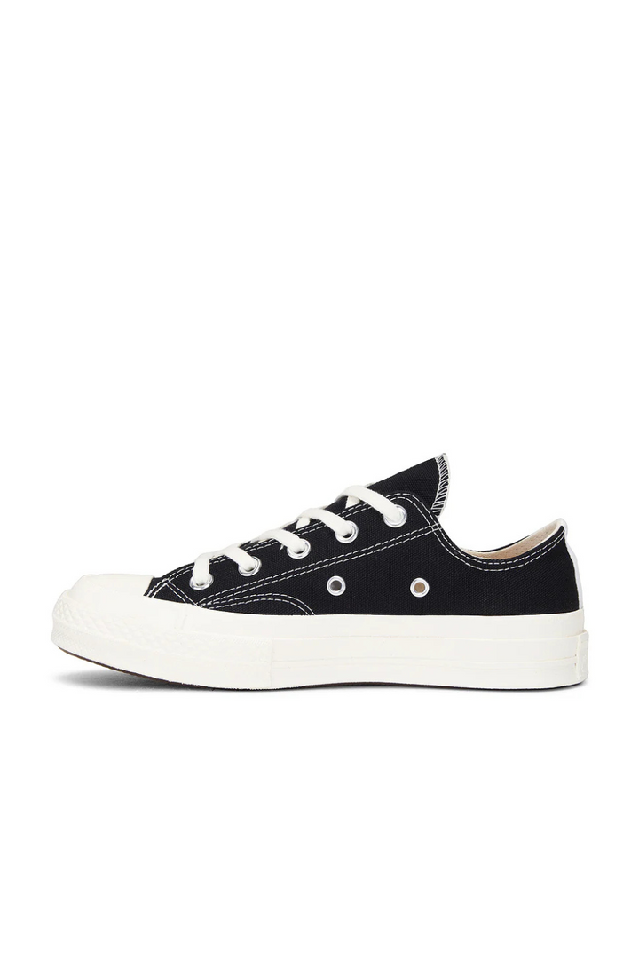 Flat lay of Comme des Garçons PLAY Low Top side view