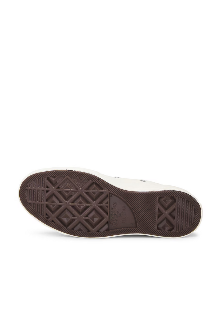 Flat lay of Comme des Garçons PLAY Low Top bottom view