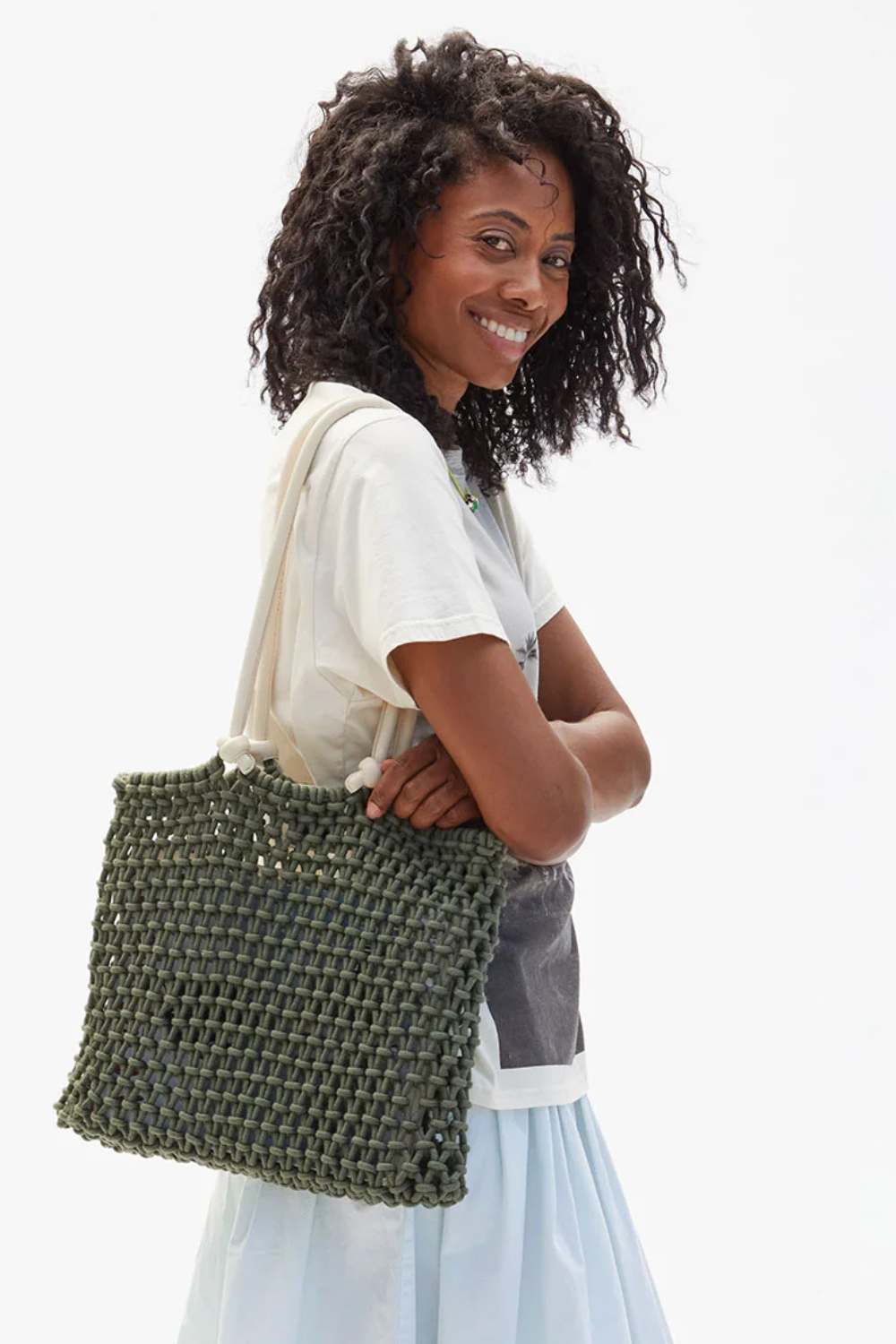 Model wearing Clare V. Sandy front view