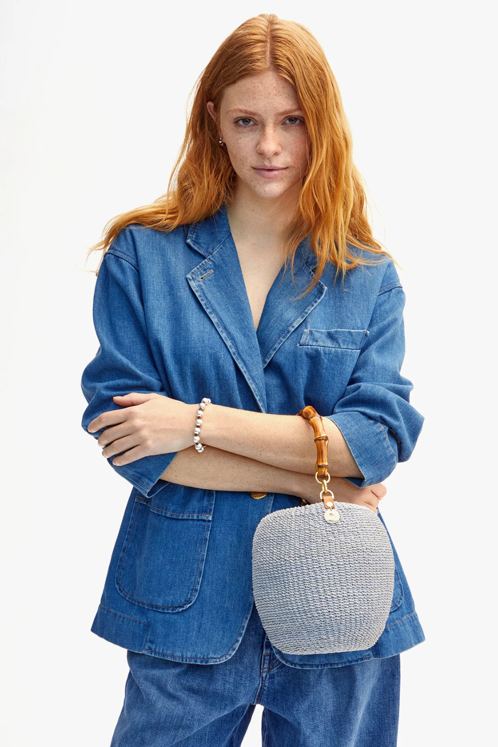 Model wearing Clare V. Pot de Miel w/ Bamboo Top Handle front view