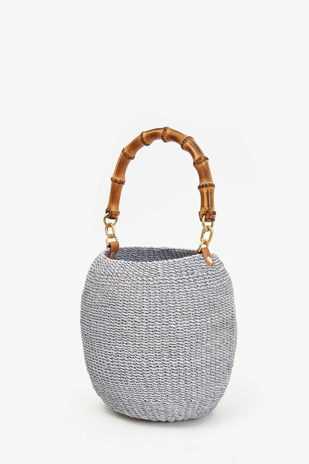 Flat lay of Clare V. Pot de Miel w/ Bamboo Top Handle front view