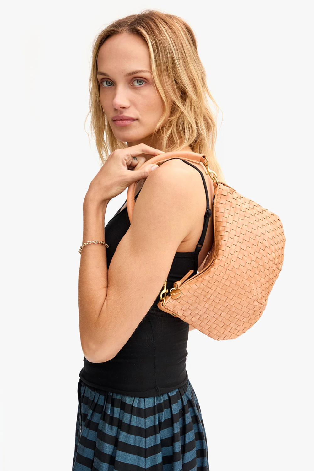 Model wearing Clare V. Petit Moyen Messenger front view