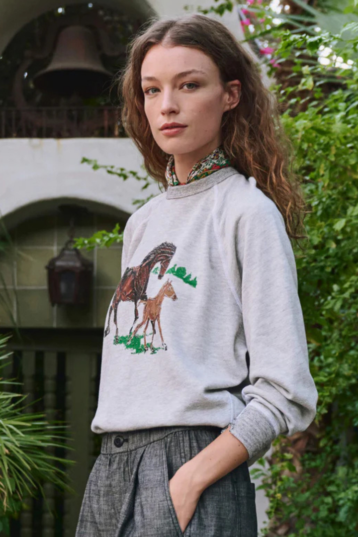 Model wearing The Great The College Sweatshirt w/ Running Horses front view