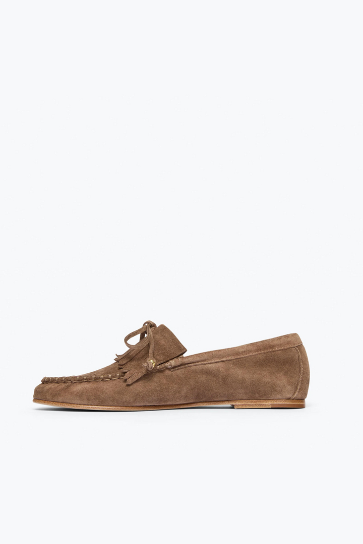 Flat lay of Frēda Salvador Celeste Low Profile Fringe side view