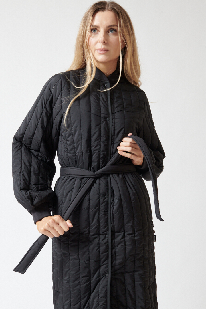 Mari wearing Rains Banja Liner W Coat front view