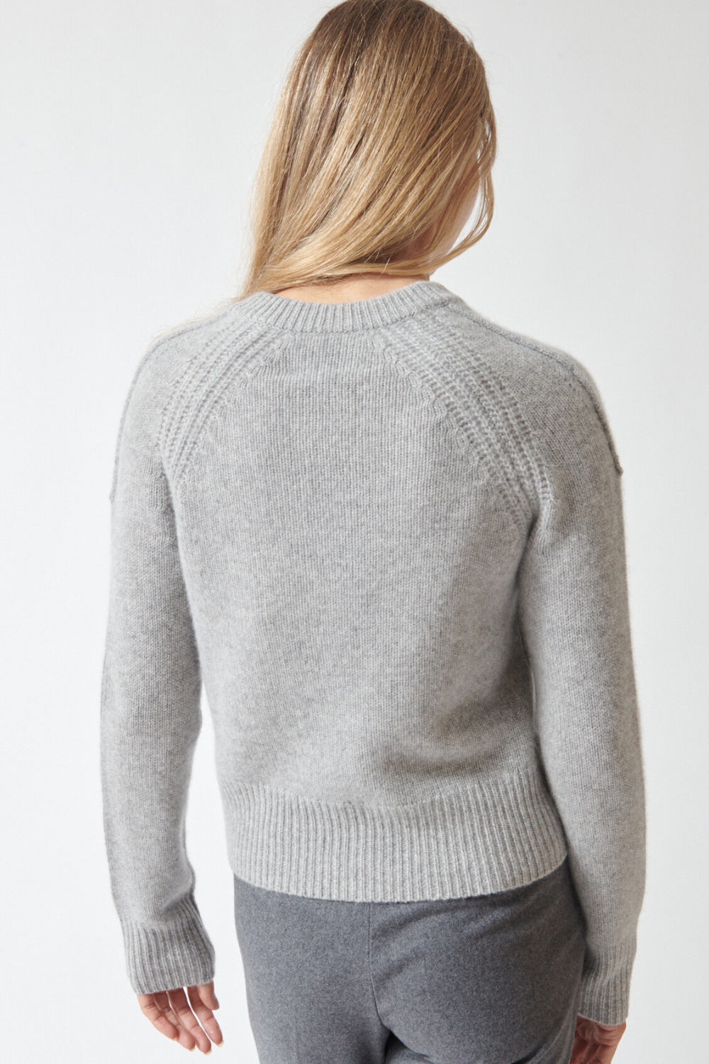 Mari wearing White + Warren Cashmere Luxe Henley rear view
