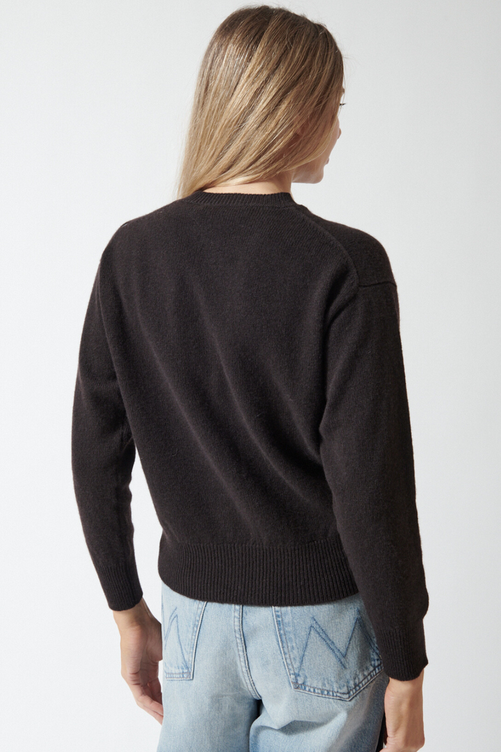 Mari wearing &Daughter Ada Crewneck Cardigan rear view