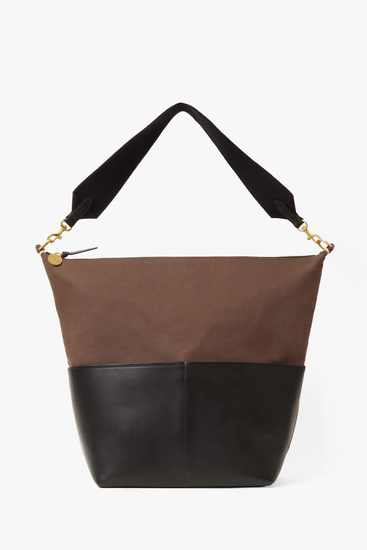 Flat lay of  Clare V. Canvas w/ Veg Sophie Bag front view