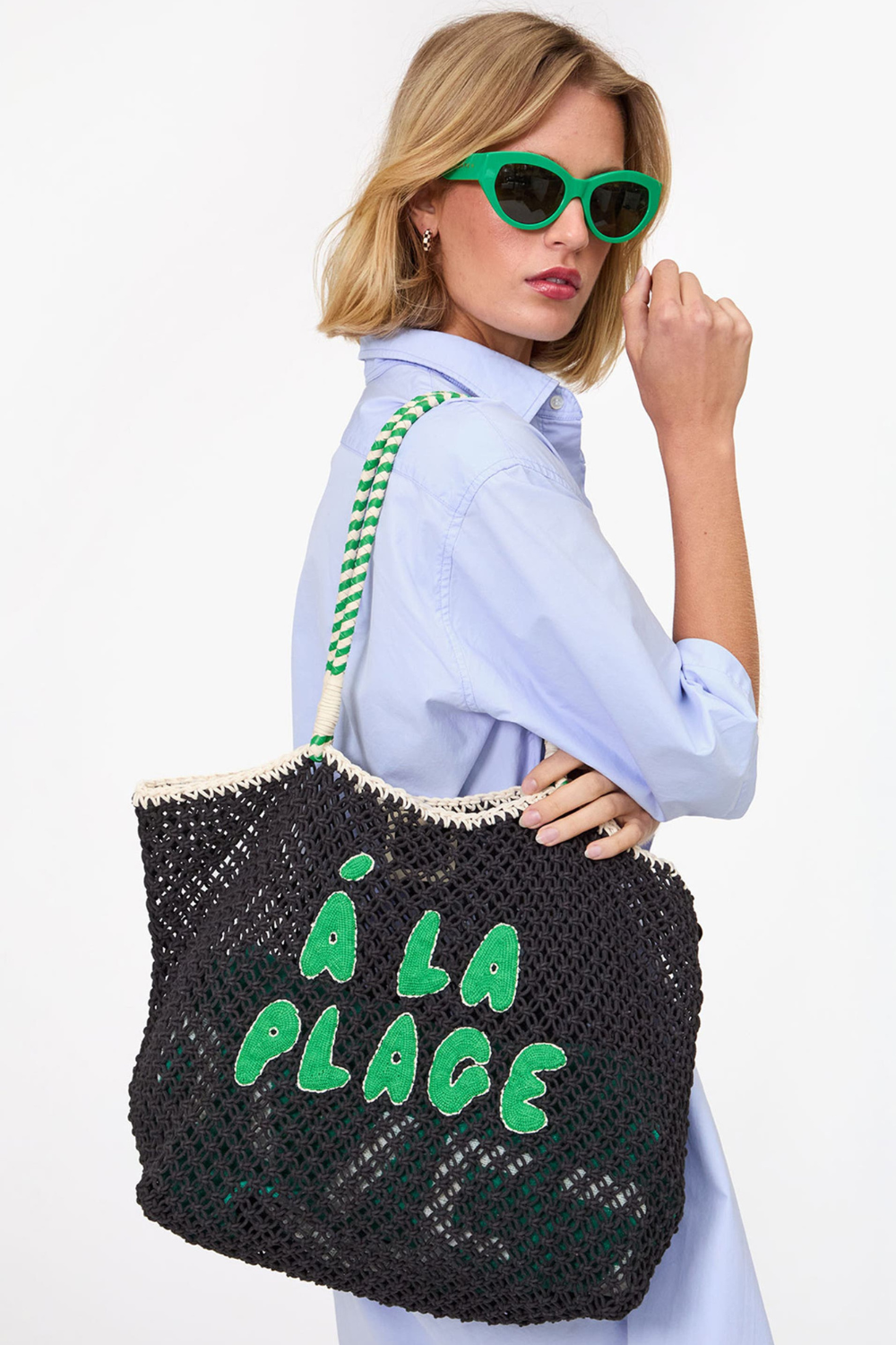 Model wearing Clare V. L'ete Tote front view