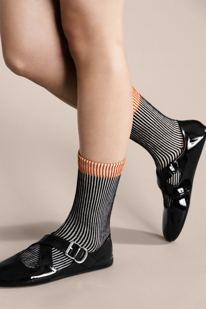 Model wearing Hansel From Basel Umbrella Crew front view