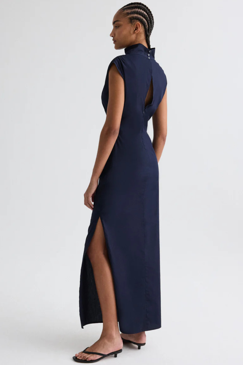 Model wearing TWP Gathered Thoughts Dress rear view